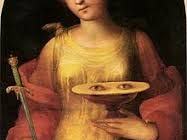 Santa Lucia è spesso rappresentata con gli occhi su un vassoio, poiché la legenda racconta che si levò gli occhi così che colui che era innamorato di lei non potesse ammirarli. (“Santa Lucia”di Domenico di Pace Beccafumi, 1521
